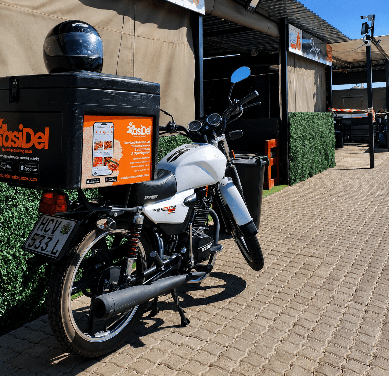 KasiDel courier ready to deliver food orders locally